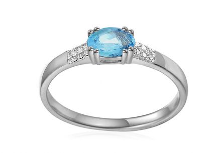 Prsten z bílého zlata s modrým topasem a brilianty 0,040 ct